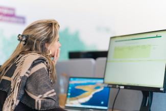 Persoon op kantoor in Elversele